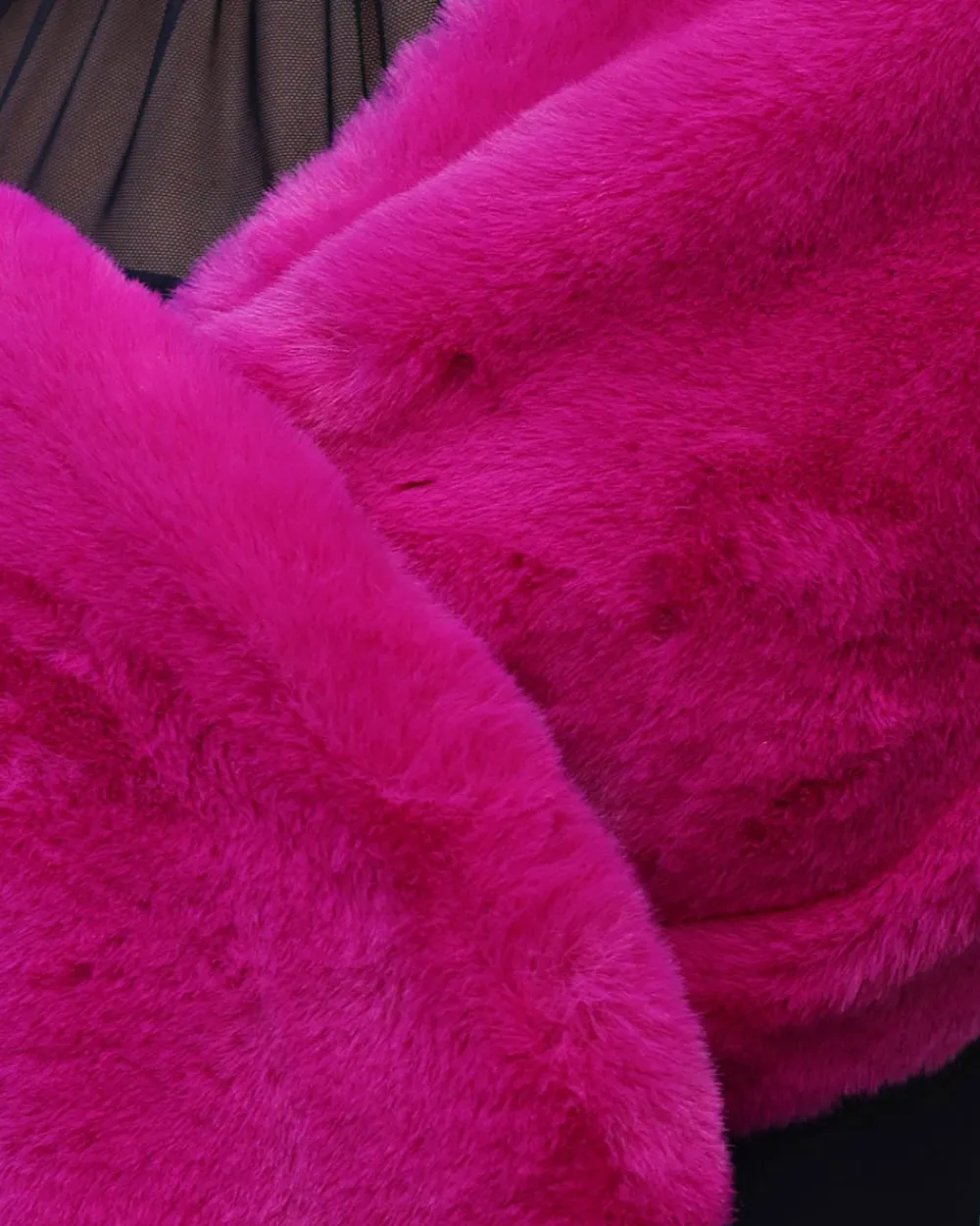estola_soft_fucsia_1.webp Juan Bernal Estolas^Estola Soft fucsia